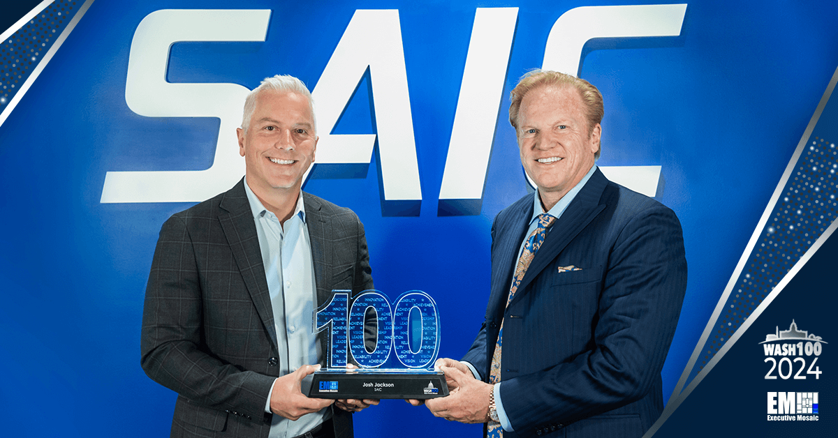 Josh Jackson (left) receiving his first Wash100 award from Jim Garrettson (right)