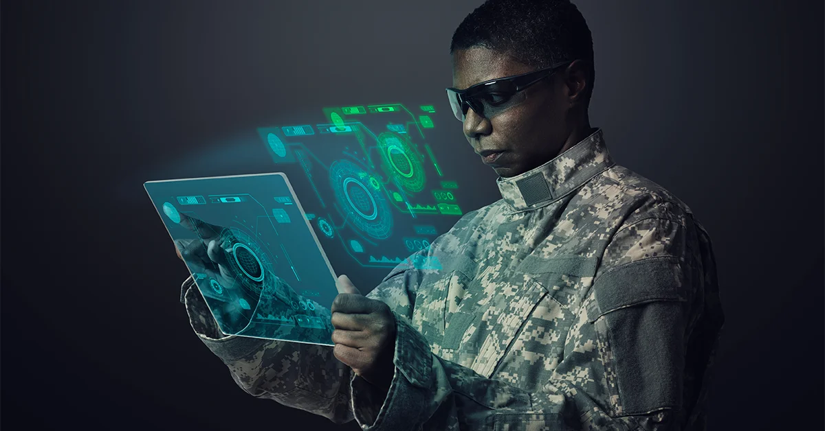 A military officer using a tablet with sensing technology
